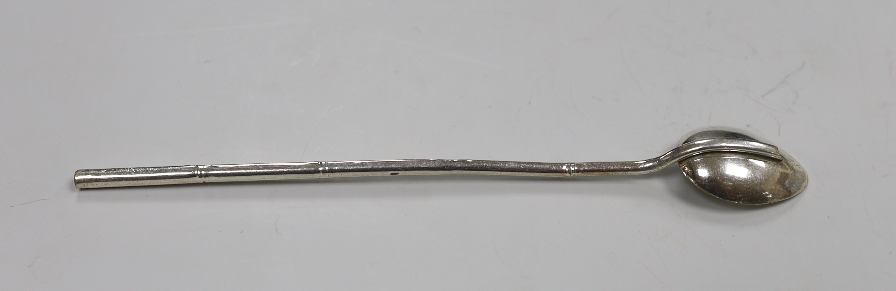 A set of eleven Asian white metal long handled spoons, stamped 925
